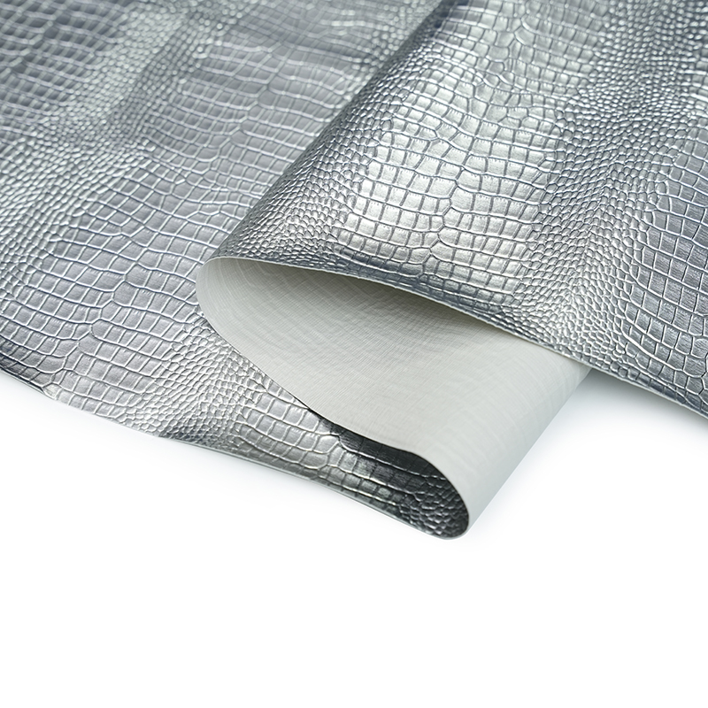 Cuero artificial metálico plateado para bolso